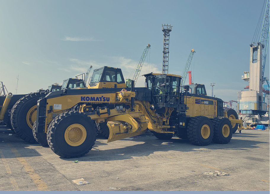 Fleet of Komatsu graders ready for dispatch, representing reliability and operational readiness